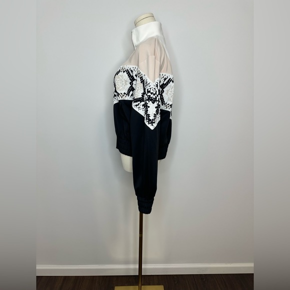 MAJE
Thelo zipped python-print sports-jersey jacket - Picture 10 of 14